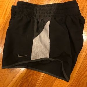 Black Nike running shorts